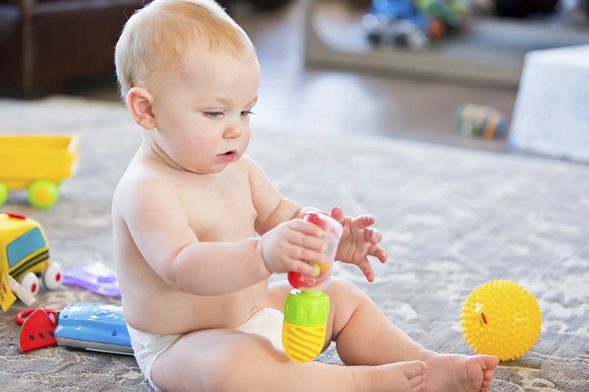 Child engaging in developmental screening activities